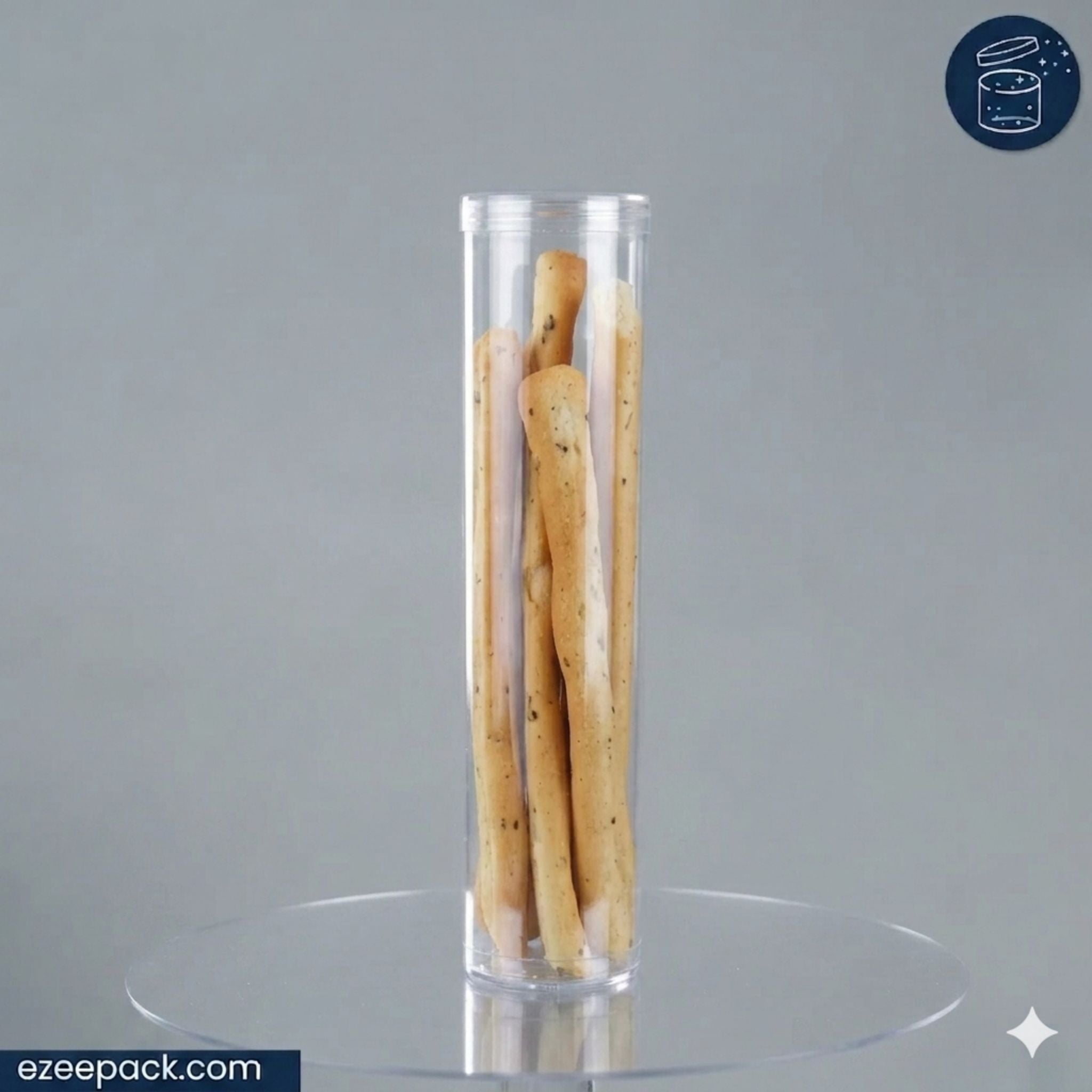 Clear cylindrical container with breadsticks on a gray background, featuring the brand 'ezeepack'.