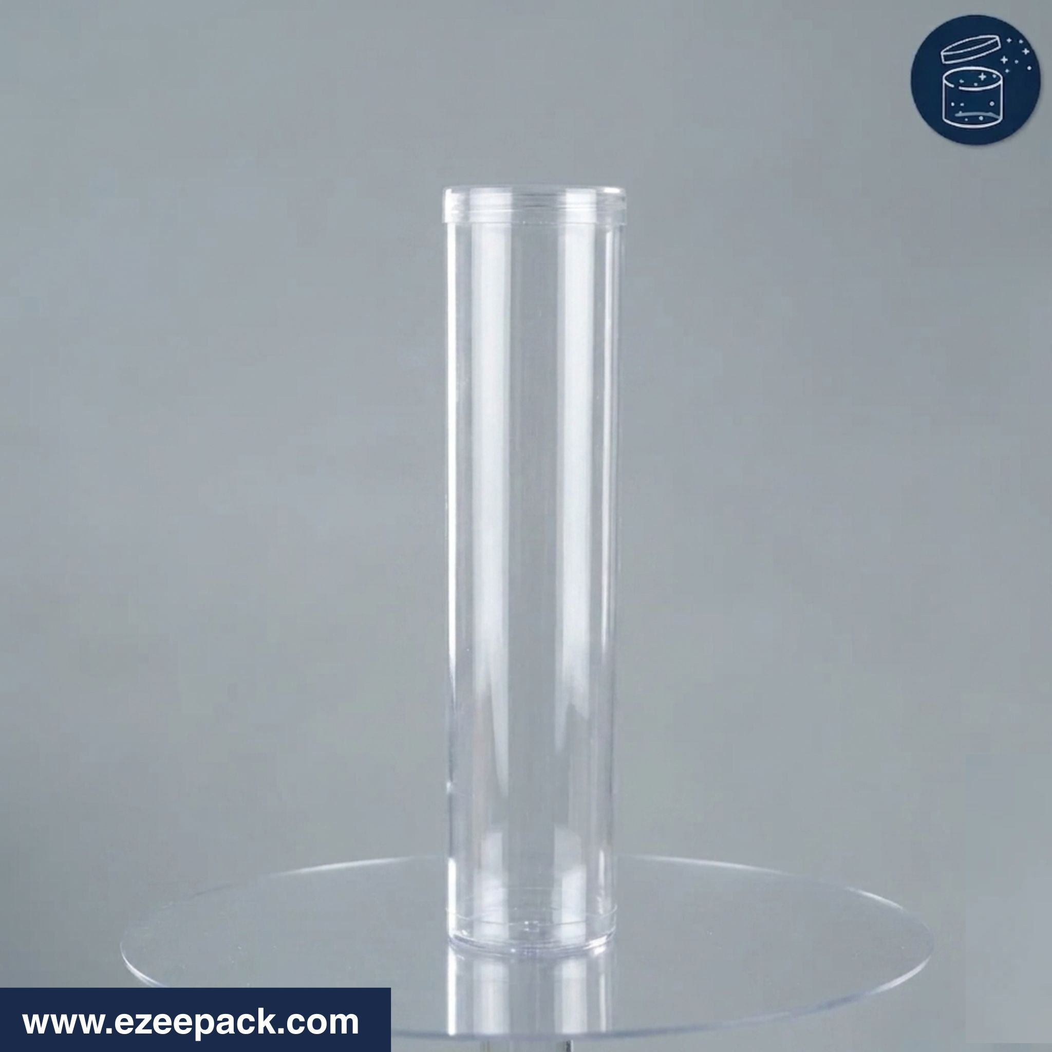 Clear cylindrical plastic display case on a gray background with 'www.ezeepack.com' branding.