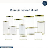 Set of clear cylindrical containers with gold rims on a white background